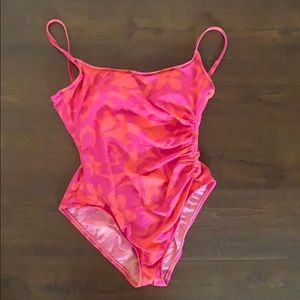 Vibrant orange/pink side gathered one piece